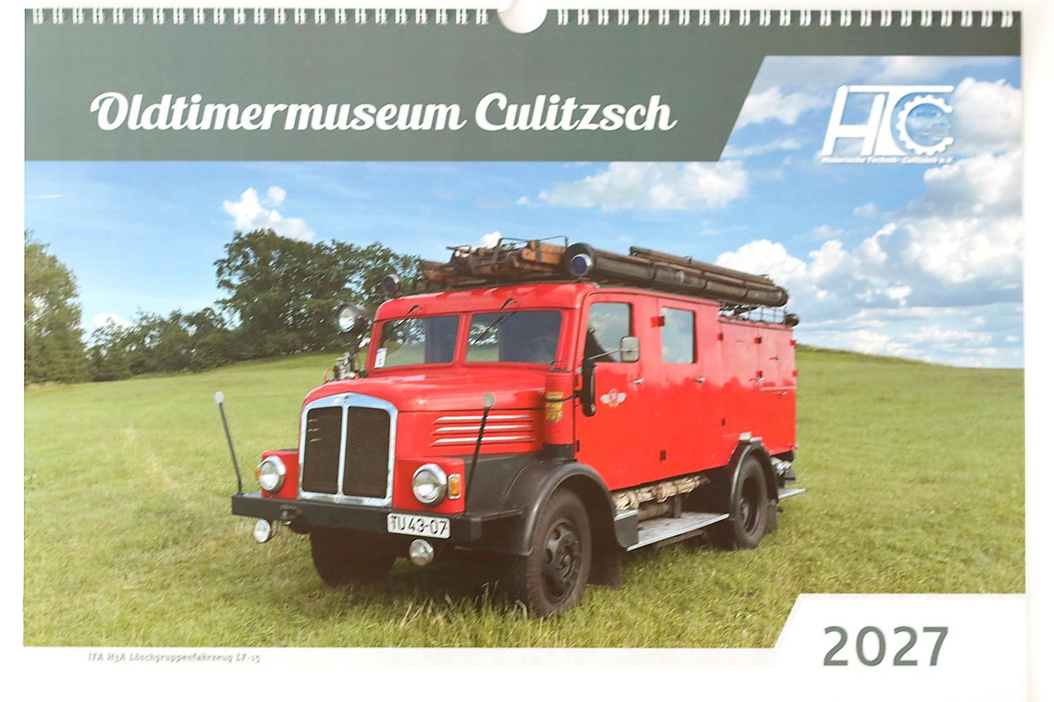 Titelblatt eines Kalenders mit einer alten Feuerwehr